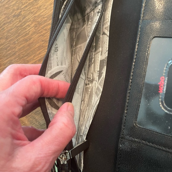 HOBO black leather wallet. NWT zippered pockets, cc slots. It’s kind of perfect. - Picture 4 of 7